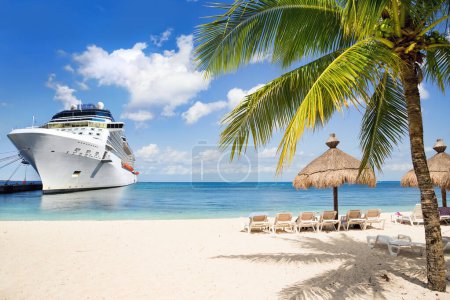 Photo for Cruise ship docked at tropical port on sunny day - Royalty Free Image