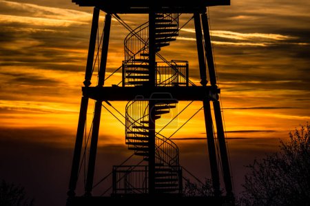 Photo for Lookout tower above the town of Hustopee in the Czech Republic. Beautiful sunset over the almond orchards in Hustopece. - Royalty Free Image