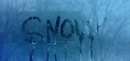 la palabra nieve en vidrio mojado. banner