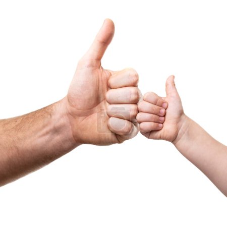 Photo for Hands of adult man and kid. Father's and child's thumbs up, isolated on white background. Continuity of generations, family values, love for neighbors, help and support concept. - Royalty Free Image