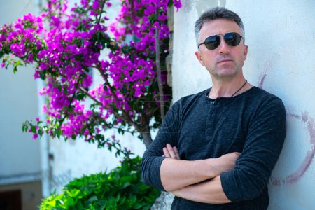 Photo for Handsome mature man. Outdoor summer male portrait. Attractive confident middle-aged man in sunglasses. - Royalty Free Image