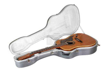 Photo for Musical instrument - Isolated Western acoustic guitar in carbon fiber hard case on a white background. - Royalty Free Image