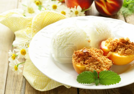 dessert baked peaches with nuts and ice cream