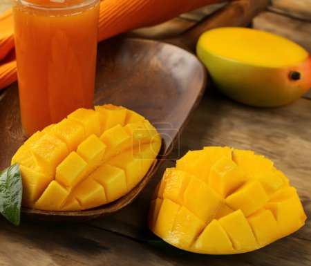 fresh ripe organic mango and juice