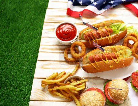 Photo for Independence day picnic hot dogs and hamburgers - Royalty Free Image