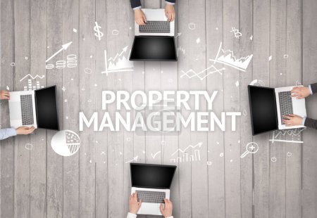 Group of Busy People Working in an Office with PROPERTY MANAGEMENT inscription, succesfull business concept