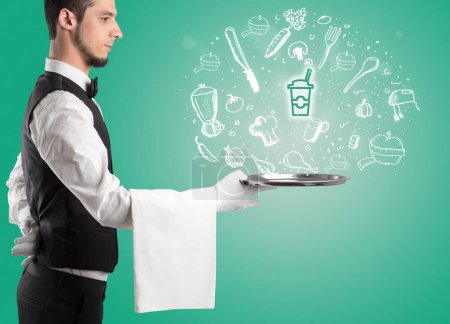 Photo for Waiter holding silver tray with takeaway cup icons coming out of it, health food concept - Royalty Free Image