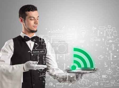 Photo for Close-up of waiter serving wifi icons, social media concept - Royalty Free Image