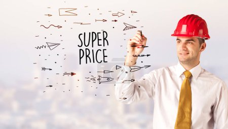 Photo for Handsome businessman with helmet drawing SUPER PRICE inscription, contruction sale concept - Royalty Free Image