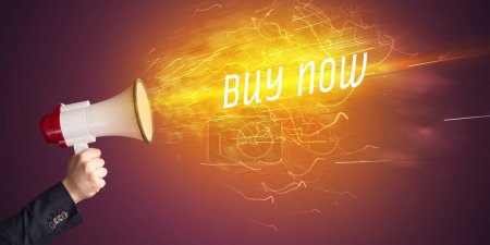 Photo for Young girld shouting in megaphone with BUY NOW inscription, online shopping concept - Royalty Free Image
