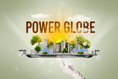 Foto de Camarero sirviendo eco ciudad con inscripción POWER GLOBE, concepto de energía renovable - Imagen libre de derechos