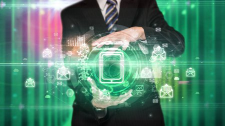 Foto de Empresario sosteniendo el icono de la tableta en sus manos con múltiples símbolos de tecnología a su alrededor - Imagen libre de derechos