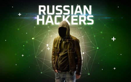 Photo for Mysterious hacker with RUSSIAN HACKERS inscription, online attack concept inscription, online security concept - Royalty Free Image