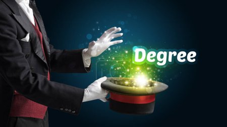 Photo for Magician is showing magic trick with Degree inscription, educational concept - Royalty Free Image