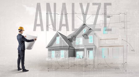 Photo for Young engineer holding blueprint with ANALYZE inscription, house planning concept - Royalty Free Image