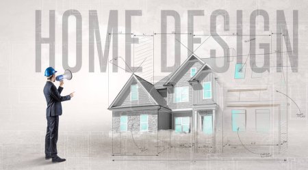 Foto de Joven ingeniero sosteniendo plano con inscripción HOME DESIGN, concepto de planificación de la casa - Imagen libre de derechos