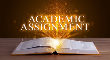 Photo for ACADEMIC ASSIGNMENT inscription coming out from an open book, educational concept - Royalty Free Image