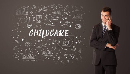 Photo for Businessman thinking with CHILDCARE inscription, business education concept - Royalty Free Image