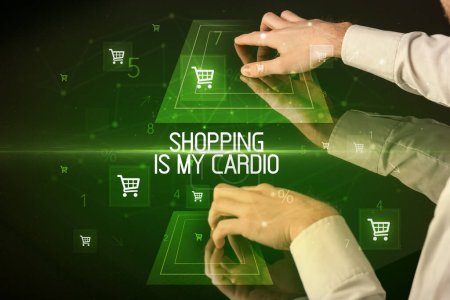 Photo for Online shopping with SHOPPING IS MY CARDIO inscription concept, with shopping cart icons - Royalty Free Image