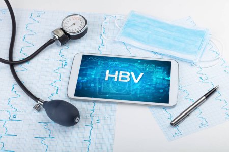 Photo for Close-up view of a tablet pc with HBV abbreviation, medical concept - Royalty Free Image