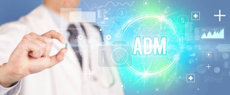 Photo for Close-up of a doctor giving you a pill with adm abbreviation, virology concept - Royalty Free Image