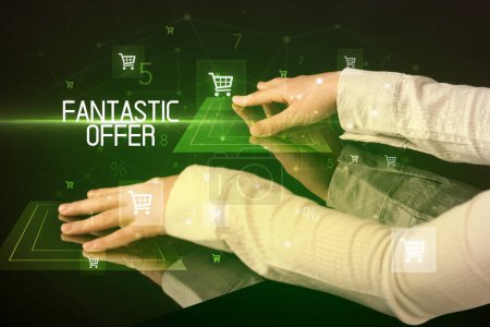 Photo for Online shopping with FANTASTIC OFFER inscription concept, with shopping cart icons - Royalty Free Image