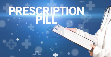 Photo for Doctor writes notes on the clipboard with PRESCRIPTION PILL inscription, first aid concept - Royalty Free Image