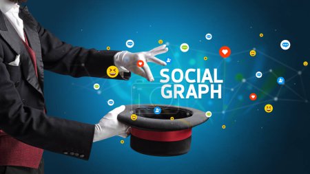 Photo for Magician is showing magic trick with SOCIAL GRAPH inscription, social media marketing concept - Royalty Free Image