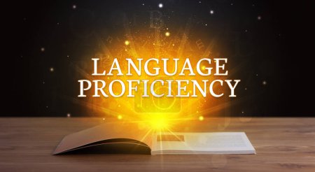 Photo for LANGUAGE PROFICIENCY inscription coming out from an open book, educational concept - Royalty Free Image
