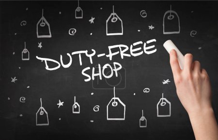 Photo for Hand drawing DUTY-FREE SHOP inscription with white chalk on blackboard, online shopping concept - Royalty Free Image