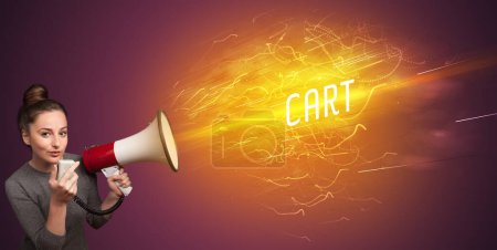 Photo for Young girld shouting in megaphone with CART inscription, online shopping concept - Royalty Free Image