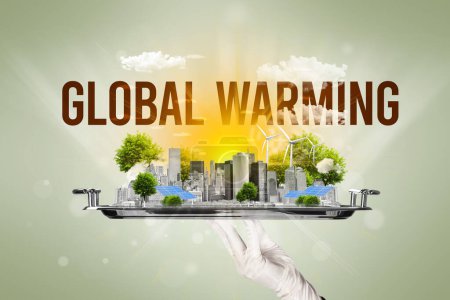 Téléchargez les photos : Serveur au service de la ville écologique avec inscription GLOBAL WARMING, concept d'énergie renouvelable - en image libre de droit
