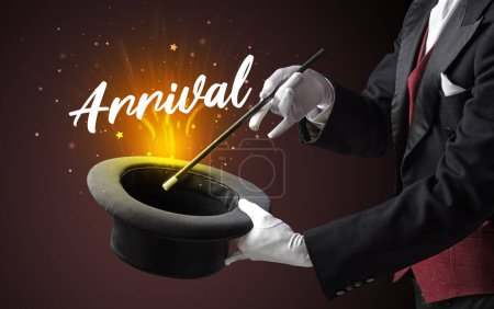 Photo for Magician is showing magic trick with Arrival inscription, traveling concept - Royalty Free Image