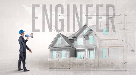 Photo for Young engineer holding blueprint with ENGINEER inscription, house planning concept - Royalty Free Image