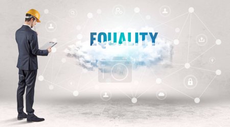 Photo for Engineer working on a social media concept with EQUALITY inscription - Royalty Free Image