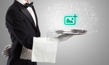 Photo for Close-up of waiter serving add photo icons, social media concept - Royalty Free Image