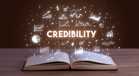 CREDIBILITY inscription coming out from an open book, business concept