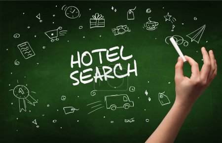 Photo for Hand drawing HOTEL SEARCH inscription with white chalk on blackboard, online shopping concept - Royalty Free Image