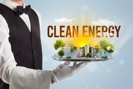 Photo for Waiter serving eco city with CLEAN ENERGY inscription, renewabke energy concept - Royalty Free Image