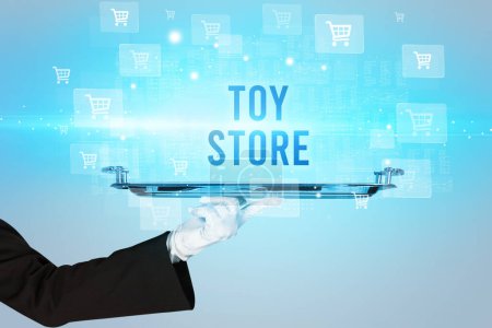 Photo for Waiter serving TOY STORE inscription, online shopping concept - Royalty Free Image