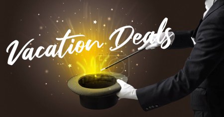 Photo for Magician is showing magic trick with Vacation Deals inscription, traveling concept - Royalty Free Image