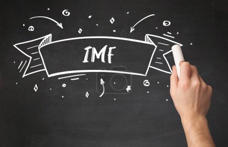 Photo for Hand drawing IMF abbreviation with white chalk on blackboard - Royalty Free Image