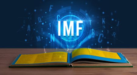 Téléchargez les photos : Inscription du FMI tirée d'un livre ouvert, concept de technologie numérique - en image libre de droit