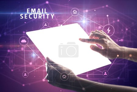 Photo for Holding futuristic tablet with EMAIL SECURITY inscription, cyber security concept - Royalty Free Image