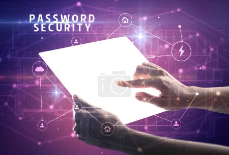 Téléchargez les photos : Tenir une tablette futuriste avec inscription PASSWORD SECURITY, concept de cybersécurité - en image libre de droit