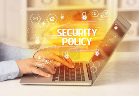 Photo for SECURITY POLICY inscription on laptop, internet security and data protection concept, blockchain and cybersecurity - Royalty Free Image