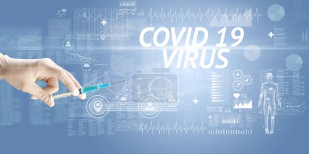 Foto de Aguja jeringa con vacuna contra virus e inscripción VIRUS COVID 19, concepto antídoto - Imagen libre de derechos