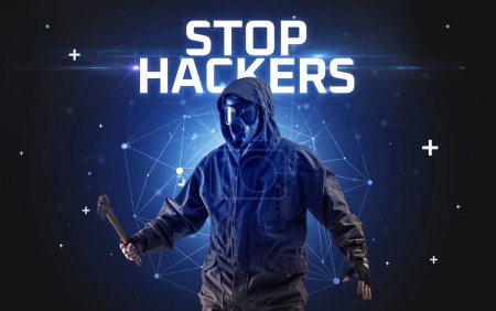 Photo for Mysterious hacker with STOP HACKERS inscription, online attack concept inscription, online security concept - Royalty Free Image