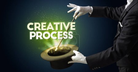 Photo for Illusionist is showing magic trick with CREATIVE PROCESS inscription, new business model concept - Royalty Free Image