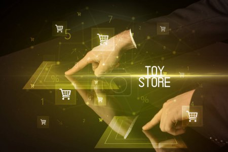 Photo for Online shopping with TOY STORE inscription concept, with shopping cart icons - Royalty Free Image